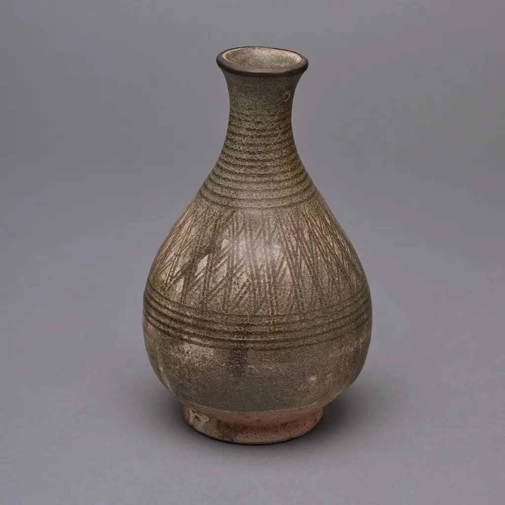 A Sawankhalok stoneware bottle, Image 1++